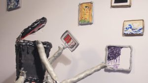 PennWest’s Team Stop Mo Rules shows an AI monster ransacking a gallery.